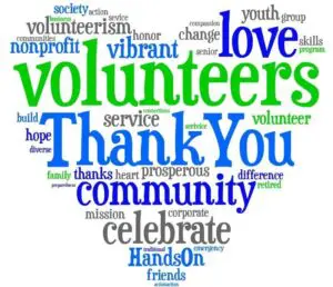 A heart shaped word cloud with words like volunteers, thank you and community.